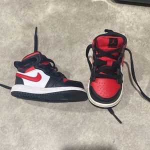 Kids Jordan’s Black and Red Nike Sneakers sz 4c